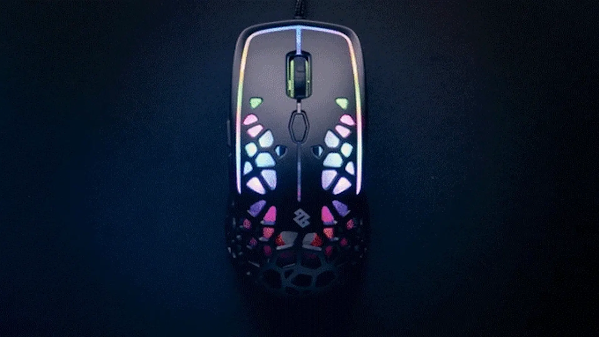 An RGB gaming mouse with pastel-colored breathing effect lighting. | Credit: Kickstarter.