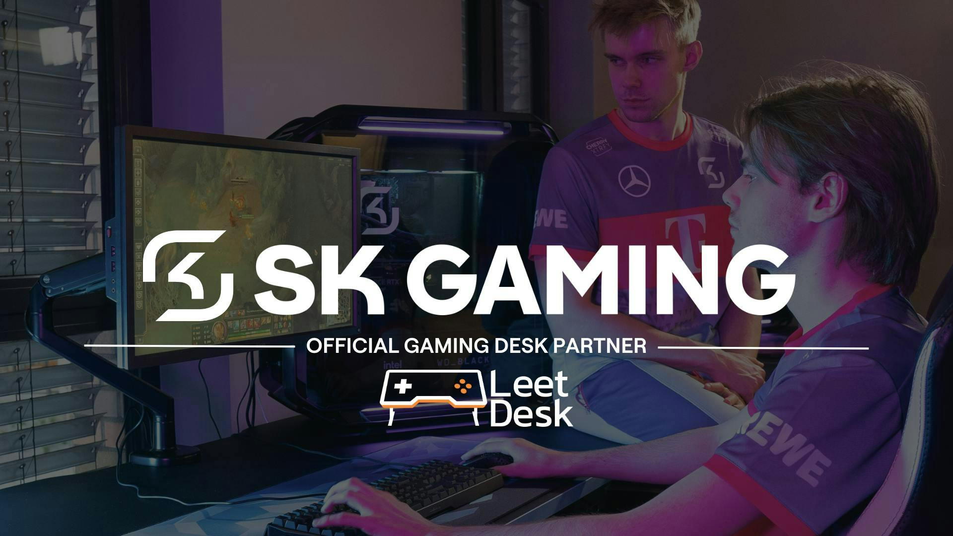 The two logos of SK Gaming and LeetDesk announcing the partnership and overlapping an image of SK Gaming members gaming on their LeetDesk.