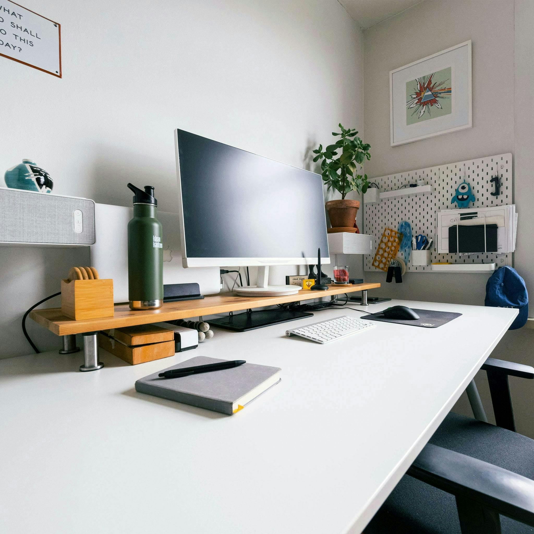 A white gaming desk combined with white hardware, also makes a great home office | Credit: Arthur Lambillotte / Unsplash